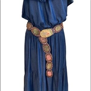 Chico’s leather and brass adjustable belt with hook and eye closure.